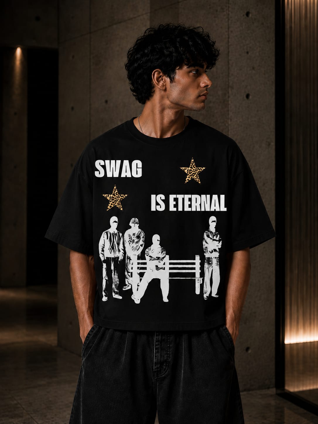 Person wearing a black t-shirt with 'SWAG IS ETERNAL' text and graphic design.